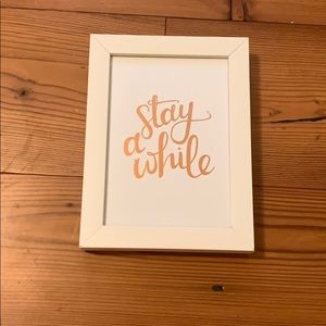 Stay a While framed print